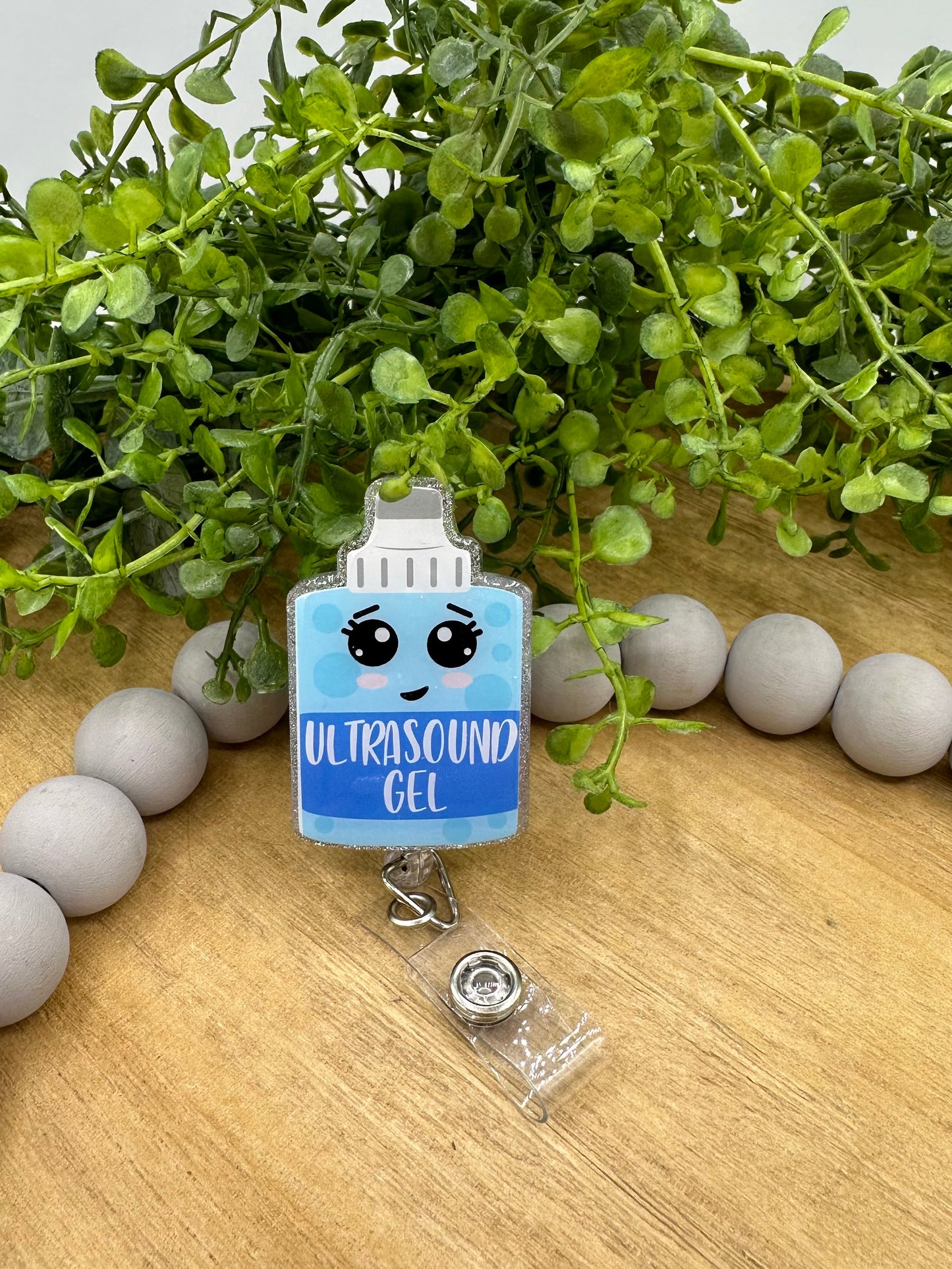 Ultrasound retractable badge reel