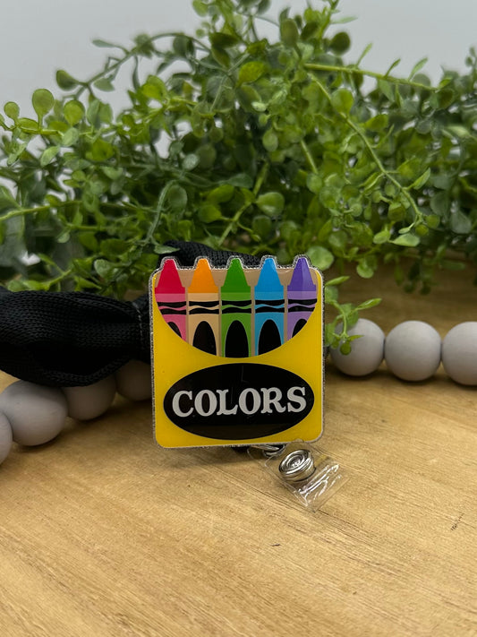 Teacher lanyard with retractable badge reel